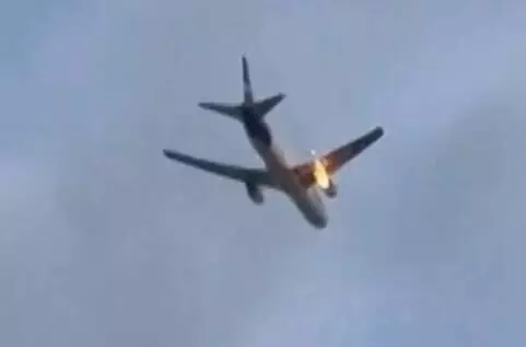 Fire erupts on cargo flight engine; aircraft lands safely, none injured Fire erupts on cargo flight engine; aircraft lands safely, none injured