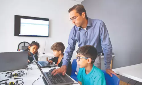 To tackle AI misuse, NY school shifts to handwritten summer essays