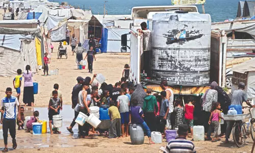 Heat and thirst drive families in Gaza to drink water that makes them sick
