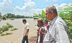 Flood-hit villages in Gangarampur and Tapan limp back to normalcy
