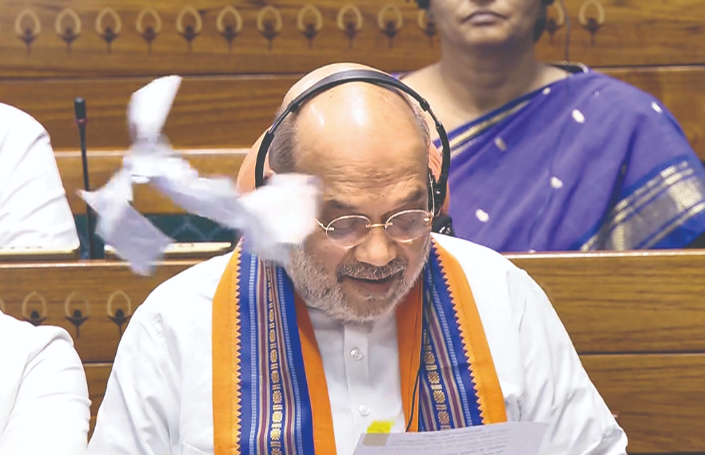 Pandemonium in LS as Shah tables 3 Bills for removal of PM, CMs, Mins held for 30 days Pandemonium in LS as Shah tables 3 Bills for removal of PM, CMs, Mins held for 30 days