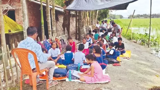 Flood-hit Jalpaiguri school holds classes on roadside