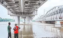 Yamuna above warning mark