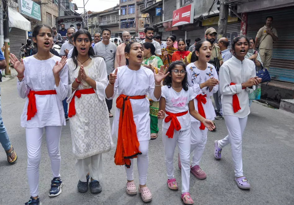 Ganesh Chaturthi: First time since militancy, Kashmiri Pandits hold rath yatra in Srinagar Ganesh Chaturthi: First time since militancy, Kashmiri Pandits hold rath yatra in Srinagar