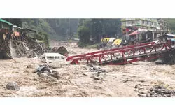 Rain showers misery on north India