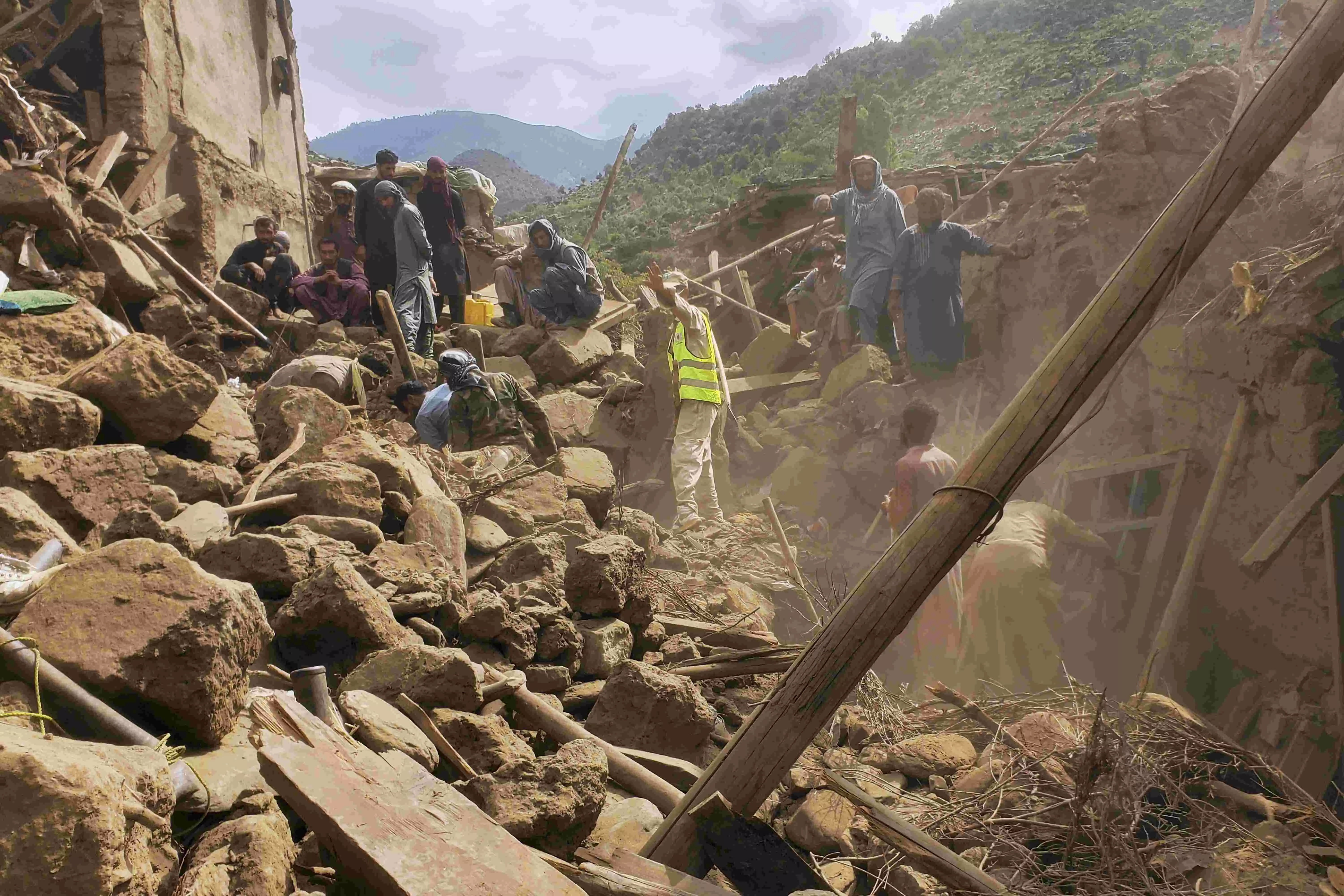 Rescuers race to find Afghan quake survivors as death toll passes 1,400 Rescuers race to find Afghan quake survivors as death toll passes 1,400
