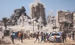 Israel strikes high-rise building, threatens to hit more in Gaza Israel strikes high-rise building, threatens to hit more in Gaza