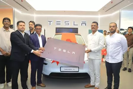 Maharashtra transport minister becomes first Tesla Model Y owner in India, vows to raise awareness about EVs Maharashtra transport minister becomes first Tesla Model Y owner in India, vows to raise awareness about EVs
