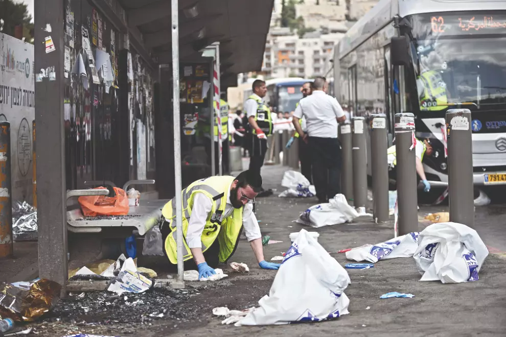 At least six people killed in shooting at Jerusalem bus stop At least six people killed in shooting at Jerusalem bus stop