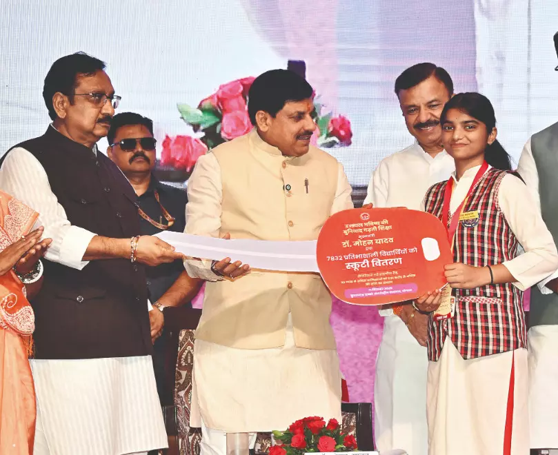 MP CM distributes scooties to 7.8K meritorious students, releases Rs 61 crore for girls’ sanitation