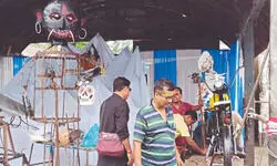 NBSTC Raiganj depot turns bus scrap into art for Biswakarma Puja NBSTC Raiganj depot turns bus scrap into art for Biswakarma Puja