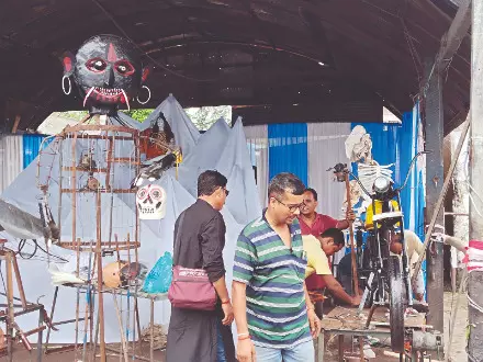 NBSTC Raiganj depot turns bus scrap into art for Biswakarma Puja