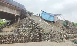 Traffic disrupted after road cave-in Traffic disrupted after road cave-in