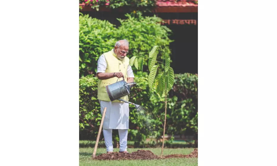 PM Modi plants sapling gifted by British King on his 75th birthday