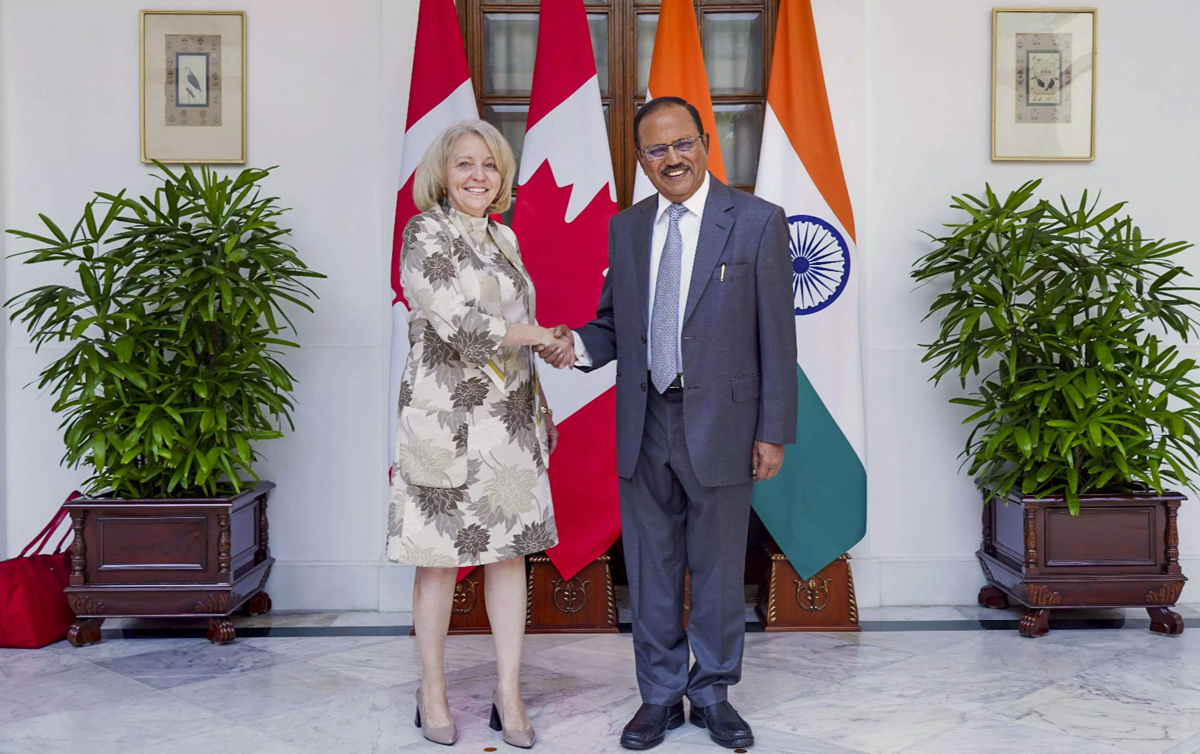India, Canada agree to work towards new chapter in ties India, Canada agree to work towards new chapter in ties