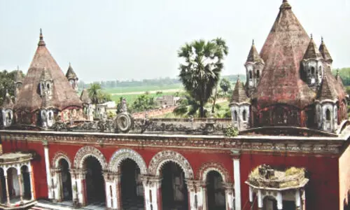Dhak beats signal the return of Maa Chaturbhuja Chandidevi at Rajbari