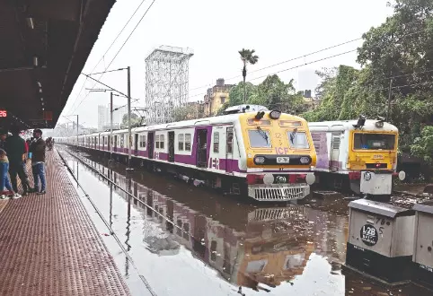 City drenched, commuters stranded: Heavy rainfall cripples transport