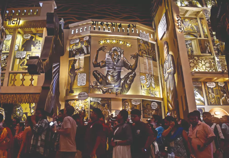 ‘Shasthi’: Puja euphoria drowns deluge fear as revellers flock to pandals
