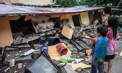 At least 69 people killed in powerful earthquake that hit the Philippines At least 69 people killed in powerful earthquake that hit the Philippines