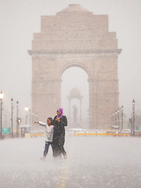 Heavy rain brings Delhi to standstill, temperatures plunge