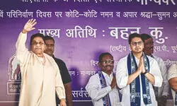 Mayawati holds massive rally, praises Yogi