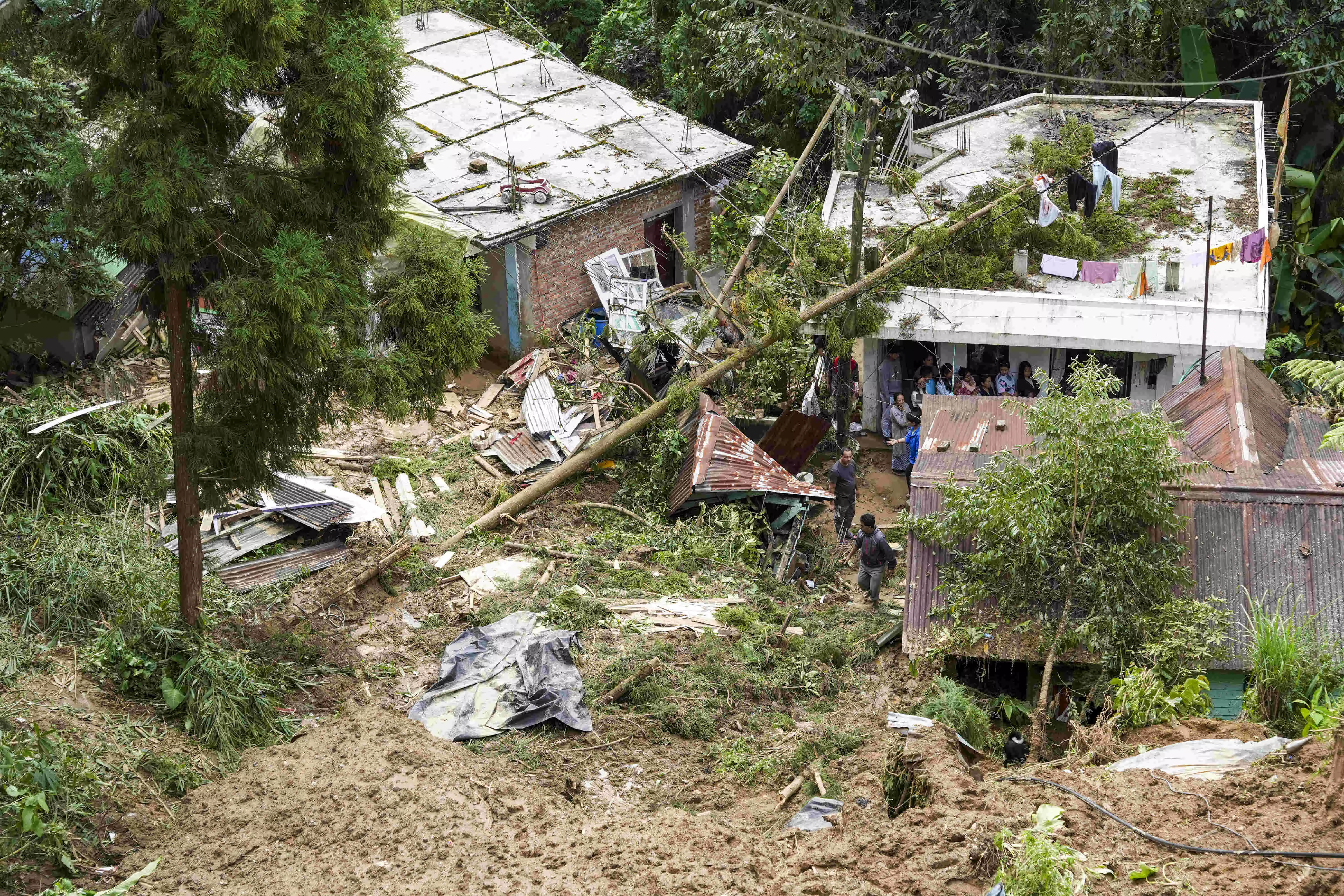 Flash floods, landslides devastate over 30 Darjeeling tea gardens; Rs 50 crore loss feared Flash floods, landslides devastate over 30 Darjeeling tea gardens; Rs 50 crore loss feared