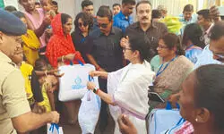 CM visits flood-hit tea garden, hands over relief materials to residents CM visits flood-hit tea garden, hands over relief materials to residents