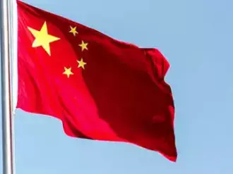 China vows to stand firm against Trumps 100% tariff threat