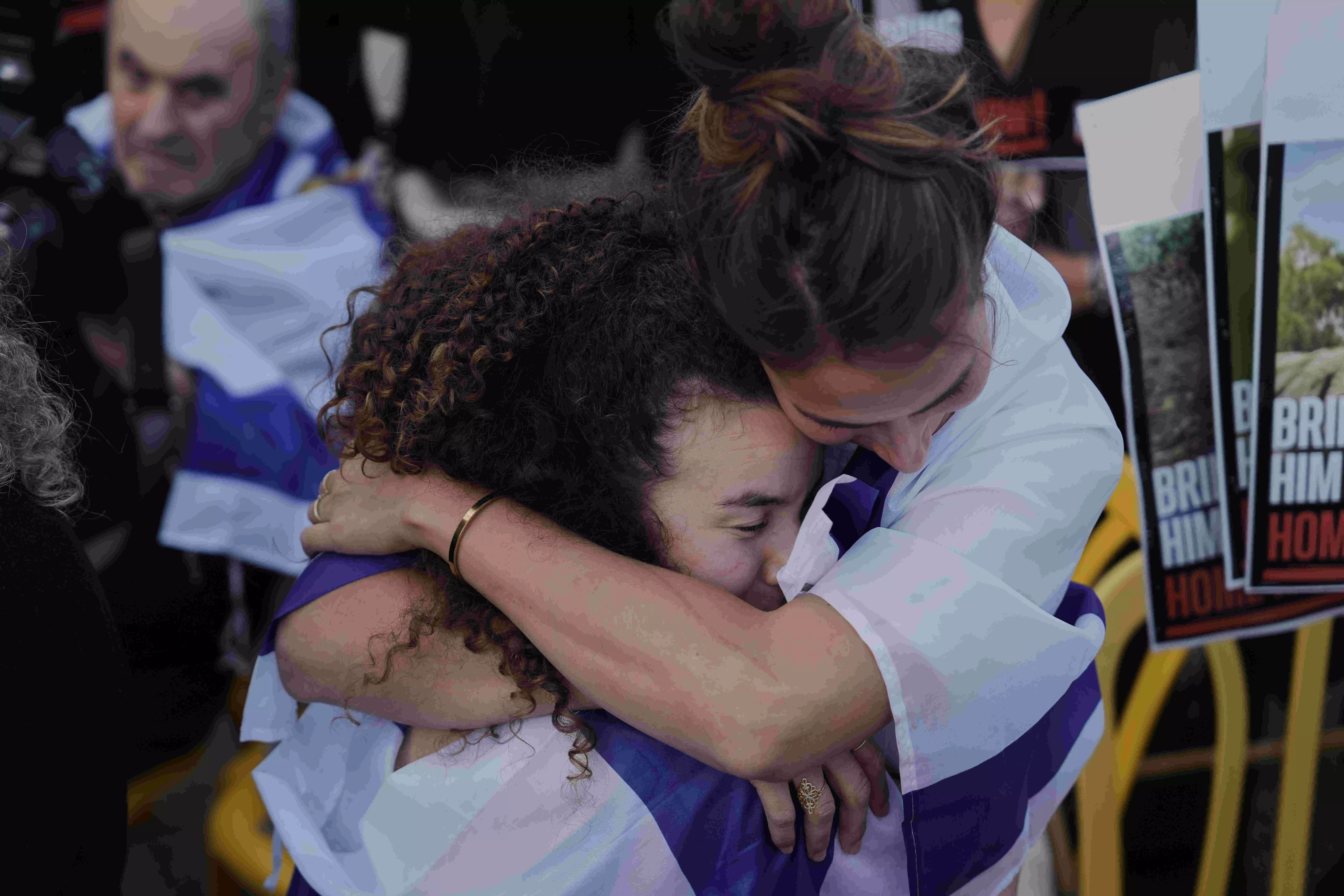 Israel says Hamas hands over first seven hostages to Red Cross as part of Gaza ceasefire