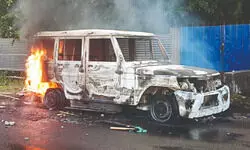 Protesters clash with police, set vehicles on fire outside prison Protesters clash with police, set vehicles on fire outside prison