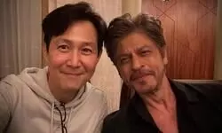 Squid Game star Lee Jung Jae poses alongside Shah Rukh Khan