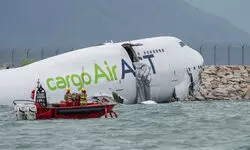 Two dead as cargo plane skids off runway and crashes into sea at Hong Kong airport