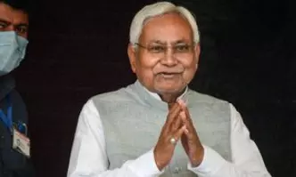 Tejashwi questions Nitishs health after he garlands female candidate at poll rally Tejashwi questions Nitishs health after he garlands female candidate at poll rally