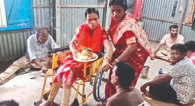 Wheelchair-bound woman travels about 62 km to bless her brothers Wheelchair-bound woman travels about 62 km to bless her brothers