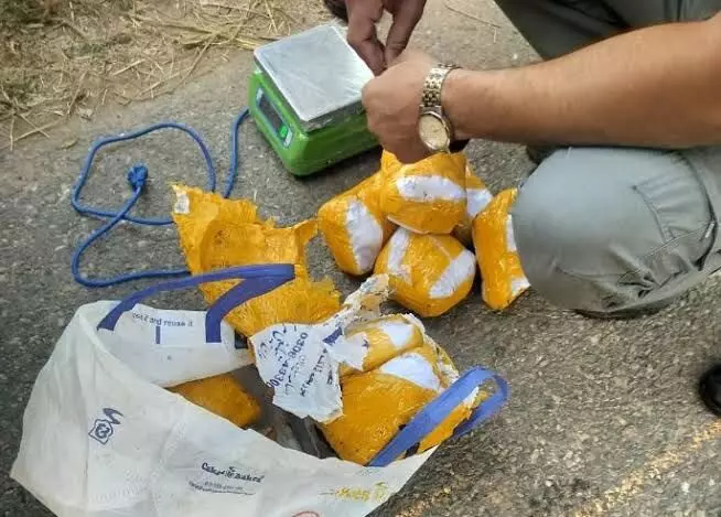 Pakistani drone drops bags containing over 5 kgs heroin along IB in Jammu Pakistani drone drops bags containing over 5 kgs heroin along IB in Jammu