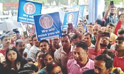 In rare scene, staff brave rain to bid farewell to Malda DM Nitin Singhania In rare scene, staff brave rain to bid farewell to Malda DM Nitin Singhania