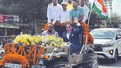 Richa Ghosh returns home to   a hero’s welcome in Siliguri