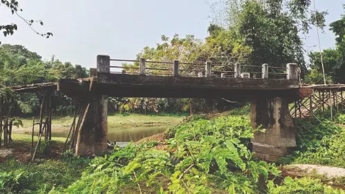 Villagers build their own approach roads to MP-funded bridge