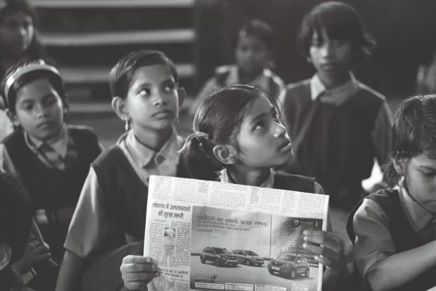 Many Lives of a Newspaper Page