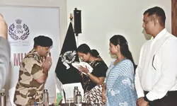 CISF hands over enhanced SBI CAPSP benefits