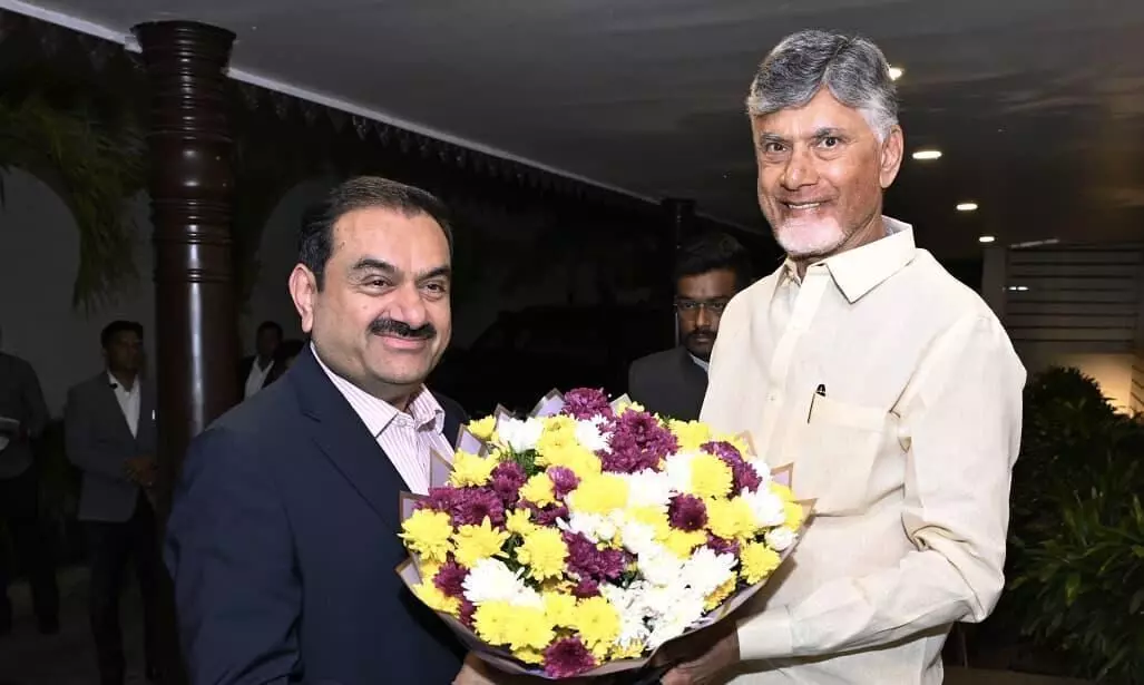 Andhra CM reviews infra projects with Adani
