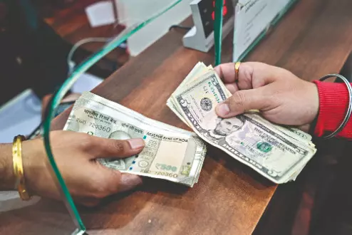 Rs recovers from record low level, rises 26 paise to 89.89 against USD