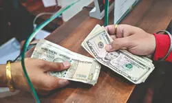 Rs recovers from record low level, rises 26 paise to 89.89 against USD