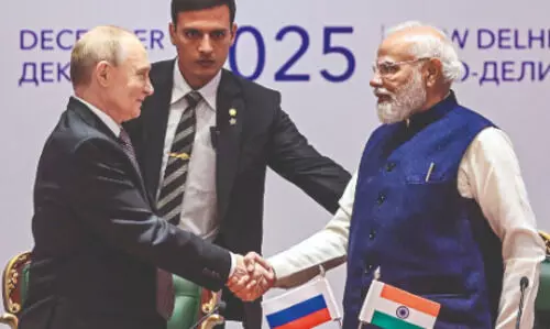 Modi, Putin ask officials to speed up investment promotion pact