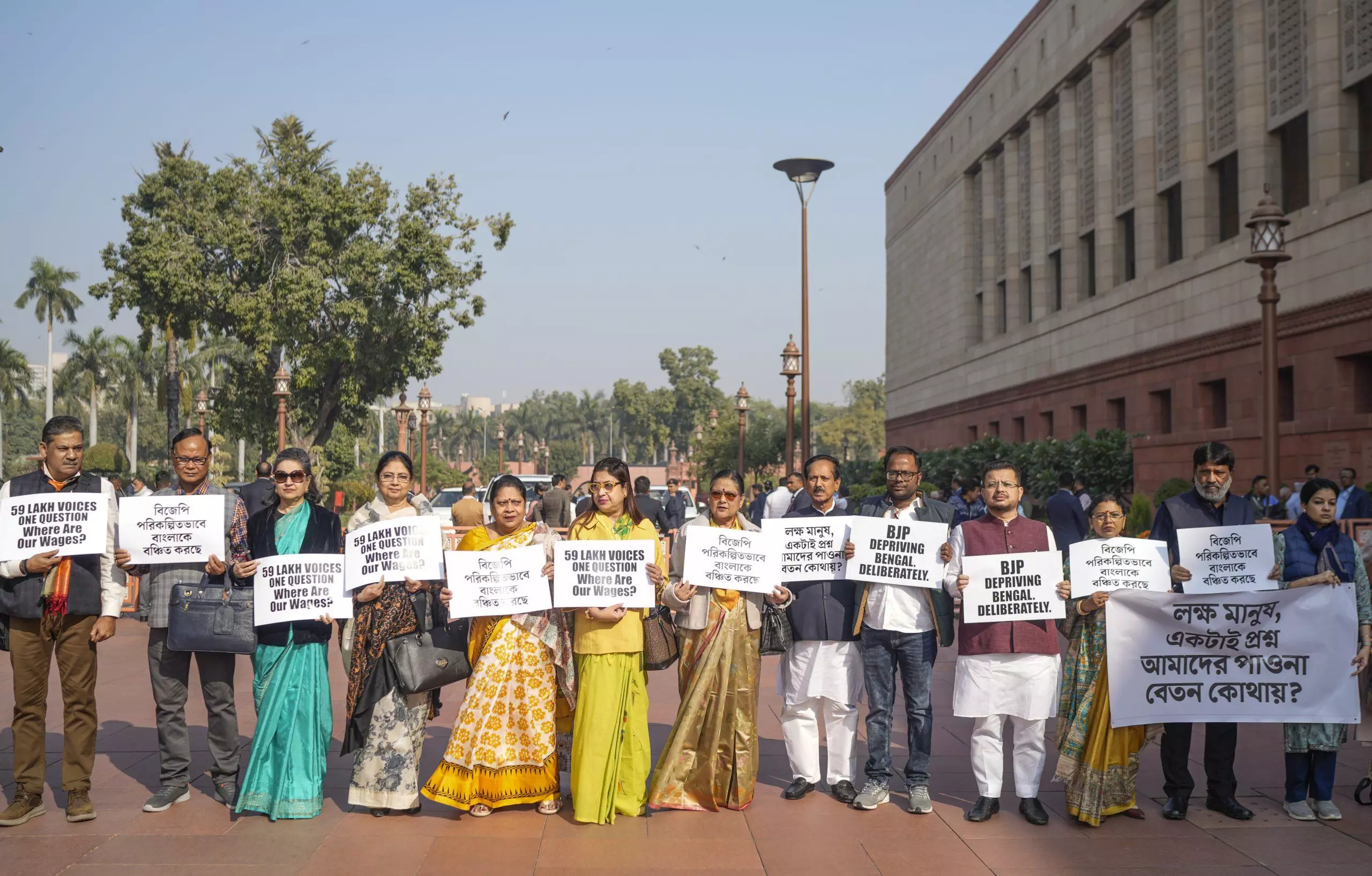 Opposition MPs protest against VB- G RAM G bill on rural employment, term it insult to Bapu Opposition MPs protest against VB- G RAM G bill on rural employment, term it insult to Bapu
