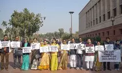 Opposition MPs protest against VB- G RAM G bill on rural employment, term it insult to Bapu Opposition MPs protest against VB- G RAM G bill on rural employment, term it insult to Bapu