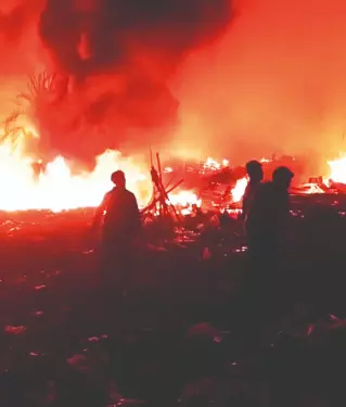 Massive fire guts slum near Eco Park, 20 engines engaged Massive fire guts slum near Eco Park, 20 engines engaged