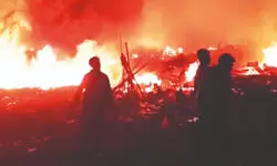 Massive fire guts slum near Eco Park, 20 engines engaged Massive fire guts slum near Eco Park, 20 engines engaged