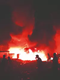 Eco Park slum fire doused after 18 hrs, 150-200 families affected Eco Park slum fire doused after 18 hrs, 150-200 families affected