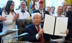 Trump signs into law defence policy bill backing deeper engagement with India including via Quad